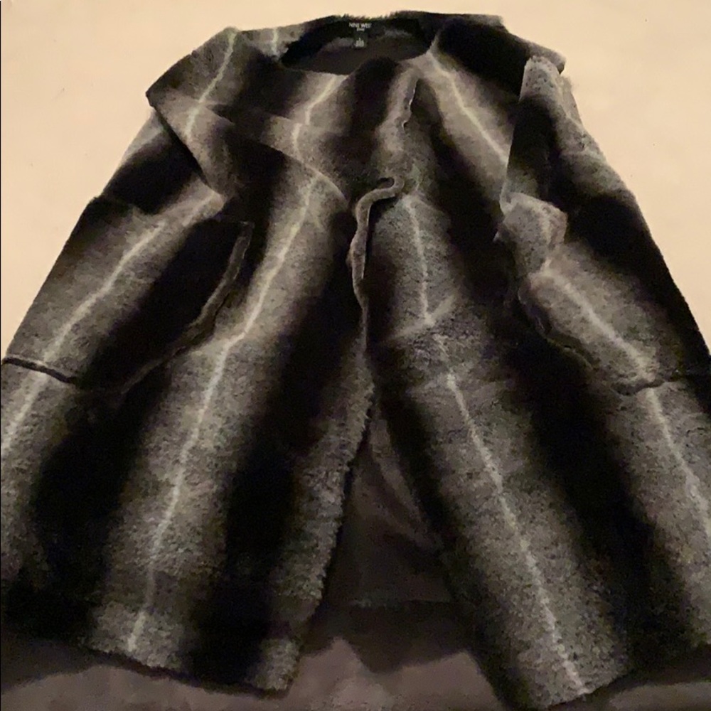 Knee length fur vest